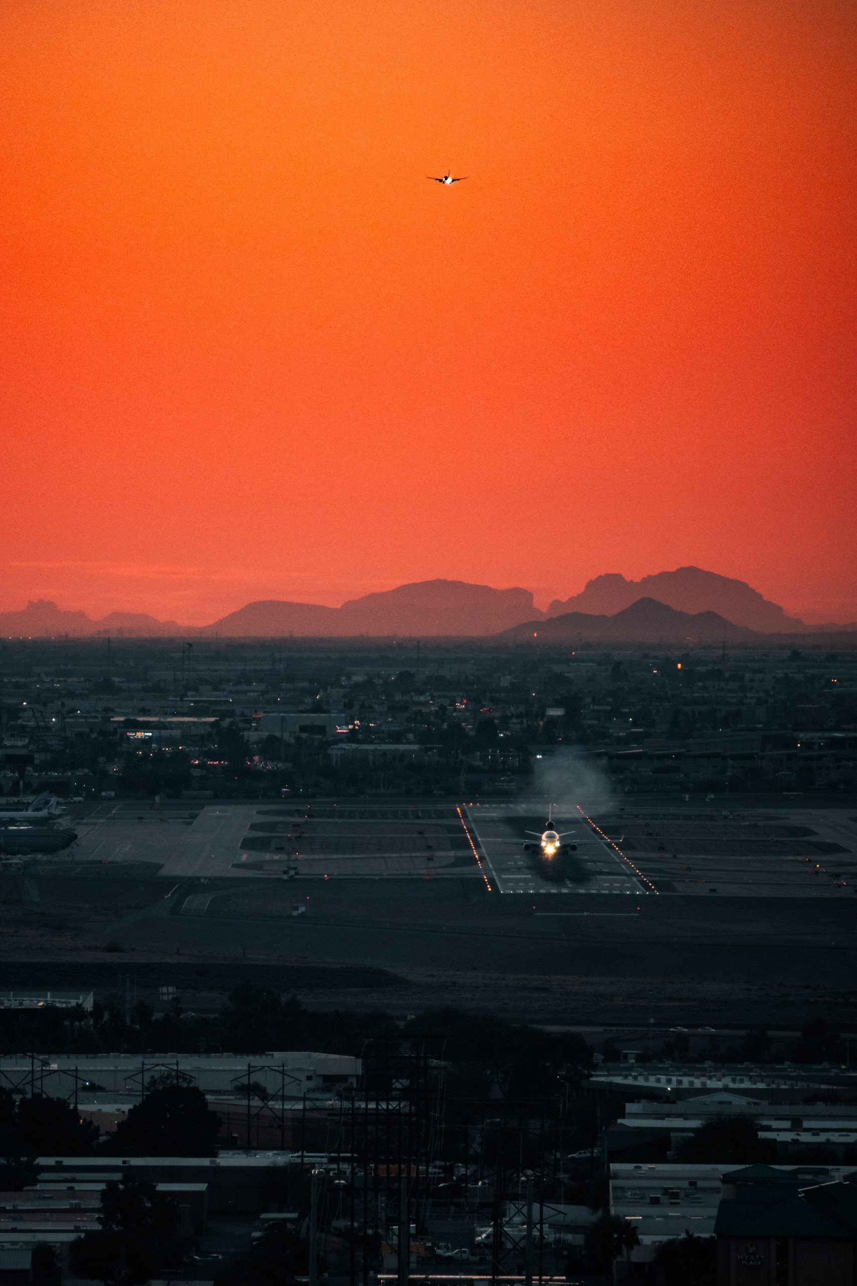 Planes landing in the sunset at Sky Harbor Airport in Phoenix